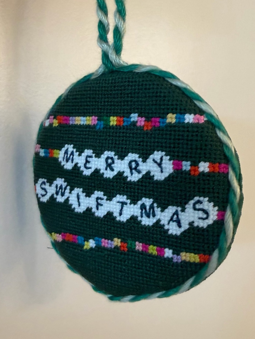 Furbish Studio Cross-Stitch Green 'Merry Swiftmas' Friendship Bracelet Ornament